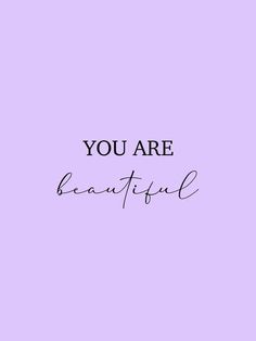 the words you are beautiful on a purple background