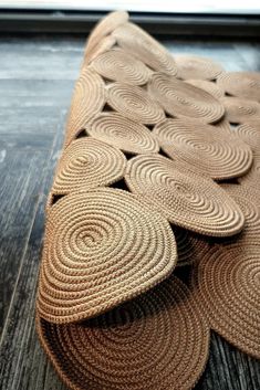 a close up of a mat on a wooden floor