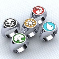 four rings with different symbols on them