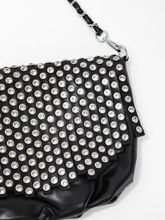 This Aria Crystal Studded Messenger Bag offers both style and convenience with its dual strap design. The crystal studs add a touch of elegance, while the practicality of two straps allows for versatile wear, providing added comfort and functionality. Enjoy the perfect combination of fashion and practicality with this messenger bag. SizeLENGTH: 8.5"HEIGHT: 8.5" WIDTH:2.5" QualityMade with premium materials for quality and endurance Imported BAG12021BK Leather Party Shoulder Bag With Rivets, Party Leather Shoulder Bag With Rivets, Leather Shoulder Bag With Rivets For Party, Chic Studded Shoulder Bag For Party, Chic Party Shoulder Bag With Studs, Studded Evening Shoulder Bag, Evening Shoulder Bag With Studs, Studded Leather Party Bag, Leather Party Bag With Studs