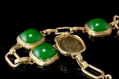 "This is a very beautiful, old and unique PEKING GLASS GILDED SILVER c. 1940 bracelet. The bracelet has a marvelous Peking glass with deep green color (11 x 11 mm) with gilded silver. It measures 7\" x 1/2\". The bracelet has a very unique and elegant feel to it and is in very good condition. 0.7 AOJFPC-806-124" Green Cabochon Costume Jewelry, Art Deco Jade Jewelry For Formal Occasions, Green Formal Bracelet Jewelry, Elegant Green Cabochon Bracelets, Formal Art Deco Jade Jewelry, Vintage Green Bangle Jewelry, Elegant Collectible Jade Jewelry, Green Cabochon Bracelet For Formal Occasions, Antique Green Jewelry For Formal Occasions