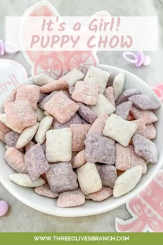 it's a girl puppy chow bowl with pink and white marshmallows