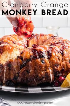 cranberry orange monkey bread on a black and white plate