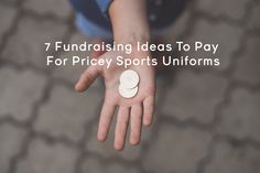 a person holding out their hand with the words 7 fundraiser ideas to pay for price sports uniforms