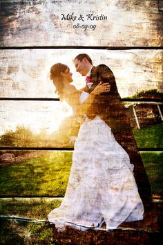 a bride and groom kissing in front of a wooden fence with the sun behind them