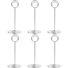 four circles are connected to each other by wire on a white background with one circle in the middle