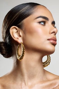 Complete your next night out attire with an elevated accessory like Rhode, our gold chunky hoop earrings. Features - Gold toned - Croissant effect- Hoop design- Lightweight- Hinge fastening Product Information Designed exclusively by Club L London Gold-toned brass (100% Brass) SKU: CL134469007 Returns Information Earrings and pierced jewellery cannot be returned for health and hygiene reasons. Health And Hygiene, Chunky Twists, Club L London, Sleek Bun, Statement Hoop Earrings, Abstract Earrings, Chunky Hoop Earrings, Chunky Earrings, Hoop Design