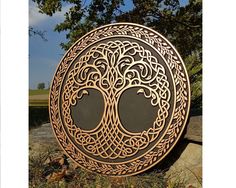 an intricately designed plaque in the shape of a tree