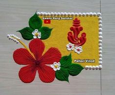 a close up of a piece of cloth with flowers on it and the words swami rang sangkar written in red