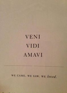 an open book with the words veni vidi amavi written in black on it