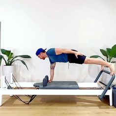 a man is doing exercises on a treadmill