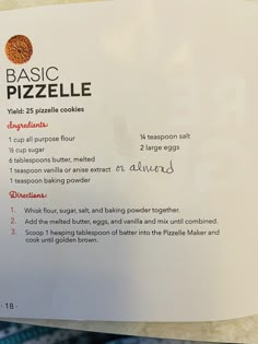 there is a piece of paper with instructions for making pizzas on the counter top