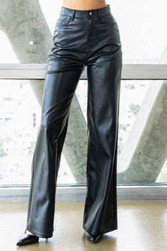 Indulge in cruelty-free chic with our Vegan Leather Wide Leg Pants. Crafted from high-quality PU, these pants showcase a modern edge with two front and back pockets, combining style and functionality. The zip-fly closure adds a touch of sophistication, making these pants a versatile addition to your wardrobe. Model is 5'8.5" and wearing a size 3Made In: ImportedFabric Contents: 100% PU Stretch fabric Non-sheer fabric Care Instructions: Dry Clean Only Size Measurement (inch): 0: (Waist), (Hips), Morgue Aesthetic, Rouge Cosplay, Wide Leg Leather Pants, High Waisted Leather Pants, Leather Black Pants, Leather Wide Leg Pants, Rare Fashion, Pants Women Fashion, Black Leather Pants