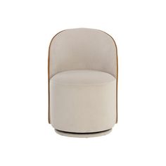 an upholstered chair with gold trimmings and a round seat cushion on the back