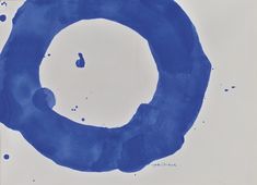 a blue circle painted on top of a white surface