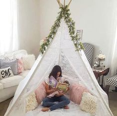 * D E T A I L S: beautiful lace teepee perfect for nurseries, playrooms and photo props  * P A C K A G I N G: all item(s) will be nicely and carefully packaged. If a gift note is required, please indicate- we'd love to help make it a special gift for someone! * S H I P P I N G: all items are ready to ship in 1-3 days although we always aim for next day shipping on all orders K E E P * I N * T O U C H Follow and tag us on Instagram @caysieandcallan.co *THANK YOU*  Please let us know if you have any questions! Your support means the world! Teepee Tent With Flowers, Tee Pee Bed Teen, Teepee Gift Table, Enchanted Forest Nursery Girl, Tent Reading Nook, Forest Nursery Girl, Wedding Teepee, Enchanted Forest Nursery, Teepee Wedding