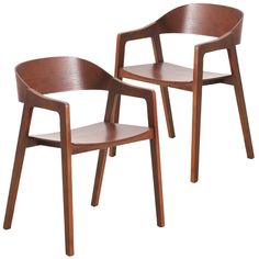 two wooden chairs sitting next to each other