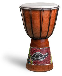 a wooden drum with an animal painted on it's side and the top part of its body