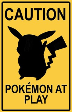 a yellow sign that says caution pokemon at play