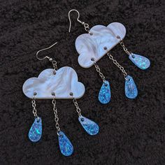 Handmade acrylic earrings inspired by rainy spring days! The cloud portion of the earring is approximately 1.75" wide. Rainy Spring, Cloud Earrings, The Cloud, Art Accessories, Acrylic Earrings, Spring Day, Holiday Design, Halloween Design, Christmas Art