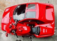 an overhead view of a red sports car