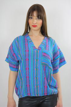 Tribal shirt Ethnic woven tunic Vintage 70s Hippie Boho abstract Gypsy kimono short sleeve striped D Vintage V-neck Top For Vacation, Blue Relaxed Fit V-neck Tunic, Blue Cotton Tops With Ikat Print, Summer Ikat Print Tops, Casual Ikat Print Tops For Spring, Casual Boho Print Tunic Top, Bohemian Blue V-neck Tops, Bohemian Patterned Short Sleeve Tops, Blue Ikat Print Top For Summer