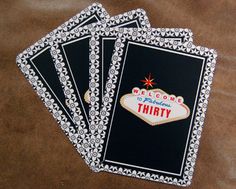 four black and white coasters with the word welcome to fabulous thirty written on them