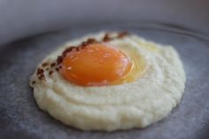 an egg is fried on top of some bread