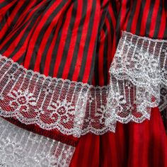 red and black striped dress with white lace