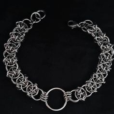 This bracelet is fully handmade with stainless steel jump rings weaved into a beautiful pattern to create a barbed wire look.  Stainless steel is the perfect metal for jewellery making as it is hypoallergenic and anti tarnish. It is also very durable and perfect for every day wear.  This bracelet comes in a standard size of 7 inch maximum length but is fully adjustable at any length up to that.  If you know your exact measurements please feel free to leave them in your order notes so I can make Chain Mail Jewelry, Jumpring Jewellery, Chain Link Jewelry, Chainmaille Jewelry Patterns, Chain Maille Patterns, Jump Ring Jewelry, Chain Jewellery, Metal Jewelry Making, Chainmail Bracelet