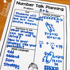 a number talk planning sheet on a wooden table with blue marker writing and numbers in it