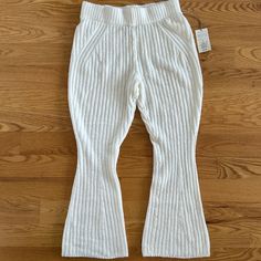 Brand New With Tags! Sweater Pants By A New Day. Creme Colored & Ribbed Material. Super Soft & Stretchy. Polyester/Acrylic/Spandex Blend. Thick Waistband. Size Small.