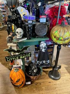 a display in a store filled with lots of halloween decorations