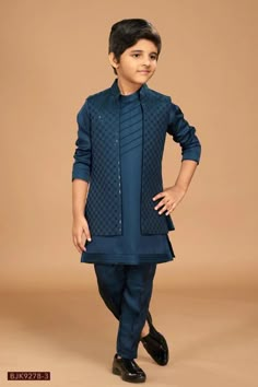 This Classic Dark Blue Silk Indo western is the perfect mix of traditional and modern fashion. Crafted from rich silk fabric, it's comfortable yet stylish- perfect for any occasion. Look timeless and incredible in this sophisticated piece! Traditional Dress For Boy, Garba Outfit, Kids Ethnic Wear, Bespoke Clothing, Brighton Uk, Kids Dress Patterns, Tailored Suit