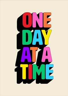 the word one day at a time written in multicolored letters