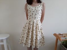 "Cream Tie Strap Cocktail Glass Print Dress - Canvas fabric - Invisible nylon zipper up back - Fixed waist - Fully lined - Pleated skirt - Ready to ship in 1-3 business days Measurements : Bust : 36\" Waist : 28\" Hips : free Length : 36.5\" Shoulder to waist : 15.5\" Model height : 5'6\" bust : 33\" waist : 25\" hips : 35\" Please read the policies tab before purchase. I can't have a model for clothes of all sizes, but I have already clearly written a model size. If you have questions about the Cotton A-line Sundress, Fitted A-line Cotton Sundress, Fitted Knee-length Cotton Sundress, Fitted Cotton Knee-length Sundress, Beige Cotton Sundress, Fitted Cotton Sundress, Fitted Cotton Midi Sundress, Beige Cotton A-line Sleeveless Dress, Beige A-line Sleeveless Cotton Dress