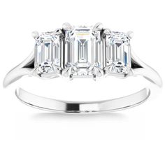 three stone diamond engagement ring in 18k white gold with baguetts set on each side