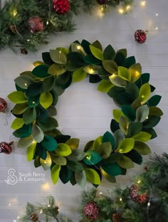 Are you looking for a unique and timeless neutral piece of decor that lasts all season?  Then, this gorgeous handmade felt leaf wreath is for you! Made with a combination of shades of "seasonal green" felt and wire, this wreath measures a very large 22" from leaf tip to leaf tip, and is sure to be a show-stopper on your front door!  If you're looking for a smaller size, I also offer it in an 18" diameter, and even smaller (or larger per request.  If the simplistic beauty of this each-catching piece wasn't enough, I've added a string of battery-powered LED lights that make this wreath truly gorgeous, day and night!!  In addition, this wreath is very lightweight and is narrow in depth, so it will fit in even the most shallow spaces (tight entryways, between a front and screen door, above a m Felt Christmas Wreath, Door Wreaths Christmas, Felt Leaf Wreath, Wreath With Lights, Sarah Berry, Wreaths Winter, Felt Leaf, Felt Leaves, Winter Wreaths