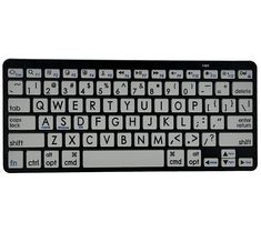 a black and white keyboard with letters on the back side, in front of a white background