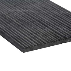 a black mat with vertical lines on it