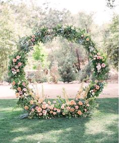 an instagram photo with flowers arranged in the shape of a circle on top of grass