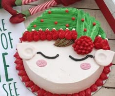 a decorated cake sitting on top of a table