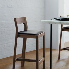 a table with two chairs and a plate on it