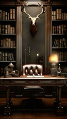 a desk with a chair and a deer head mounted on the wall above it in front of bookshelves