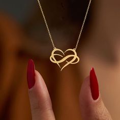 Discover the timeless elegance and eternal beauty of our infinity heart necklace collection. Crafted with exquisite attention to detail, each piece captures the delicate balance between love and infinity. Indulge in the graceful allure of our heart and infinity necklace, a symbol of everlasting affection and infinite possibilities. Whether you prefer the classic charm of white gold or the radiant warmth of gold, our infinity heart pendant is sure to captivate hearts and inspire admiration. gold Heart And Infinity, Hearts Entwined, Necklace Infinity, Eternal Beauty, Infinity Jewelry, Infinity Heart, Necklace Collection, Heart Pendant Gold, Infinity Necklace