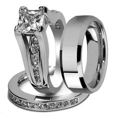 two wedding rings with princess cut diamonds on them