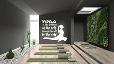 there is a yoga room with many mats on the floor