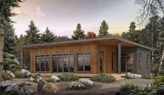 this is an artist's rendering of a small cabin style home in the woods