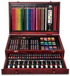 an open wooden box with many different colored crayons in it