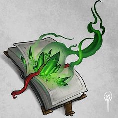 an open book with green designs on it